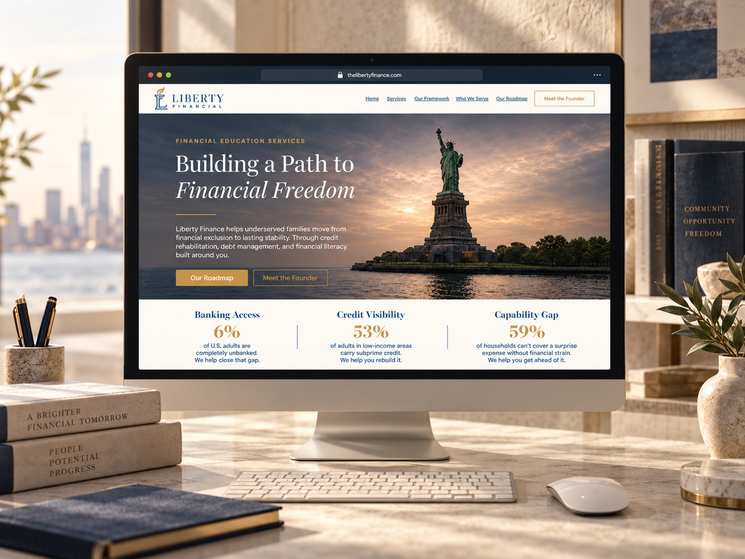 Liberty Financial website homepage showing the headline Building a Path to Financial Freedom over a Statue of Liberty photograph.